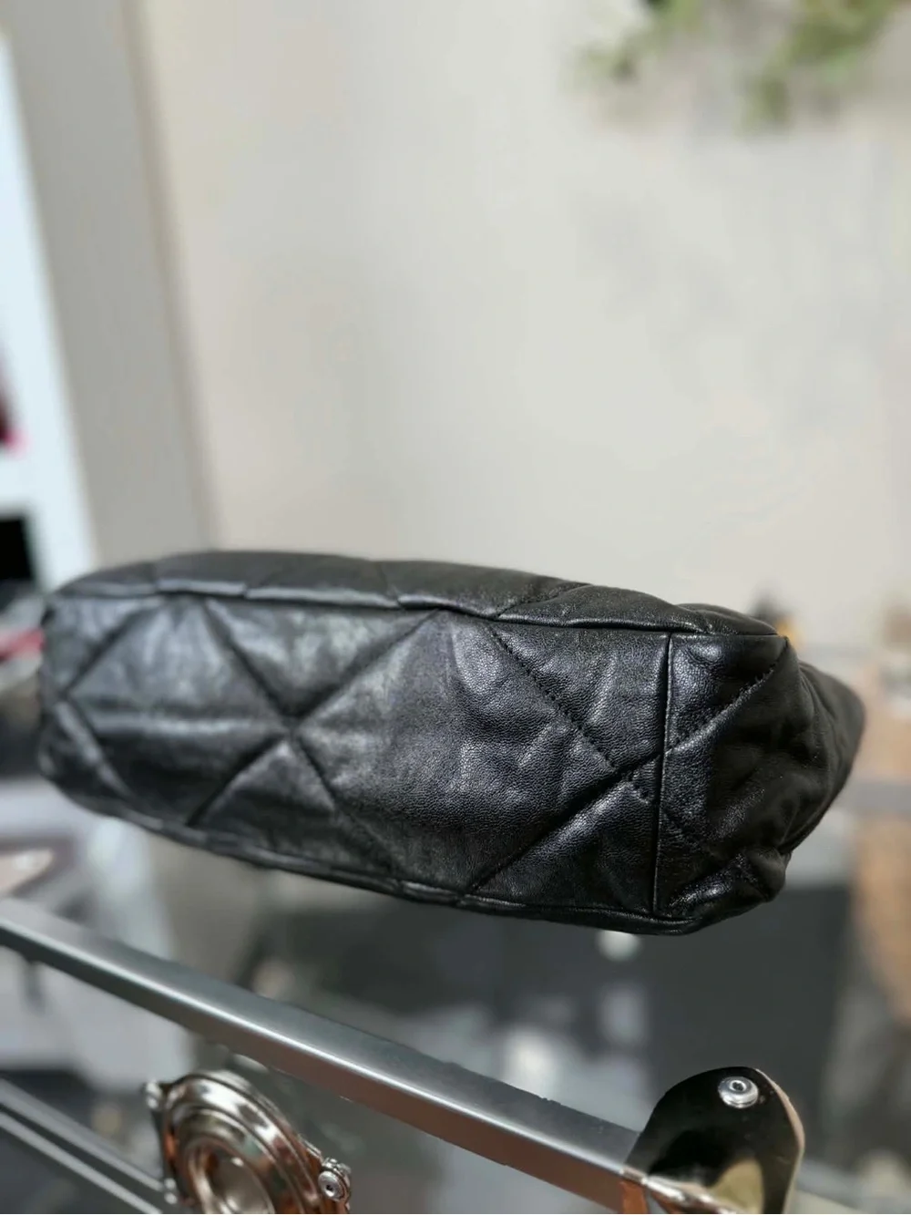 CHANEL Black Quilted Shoulder Bag with Gold Chain CC